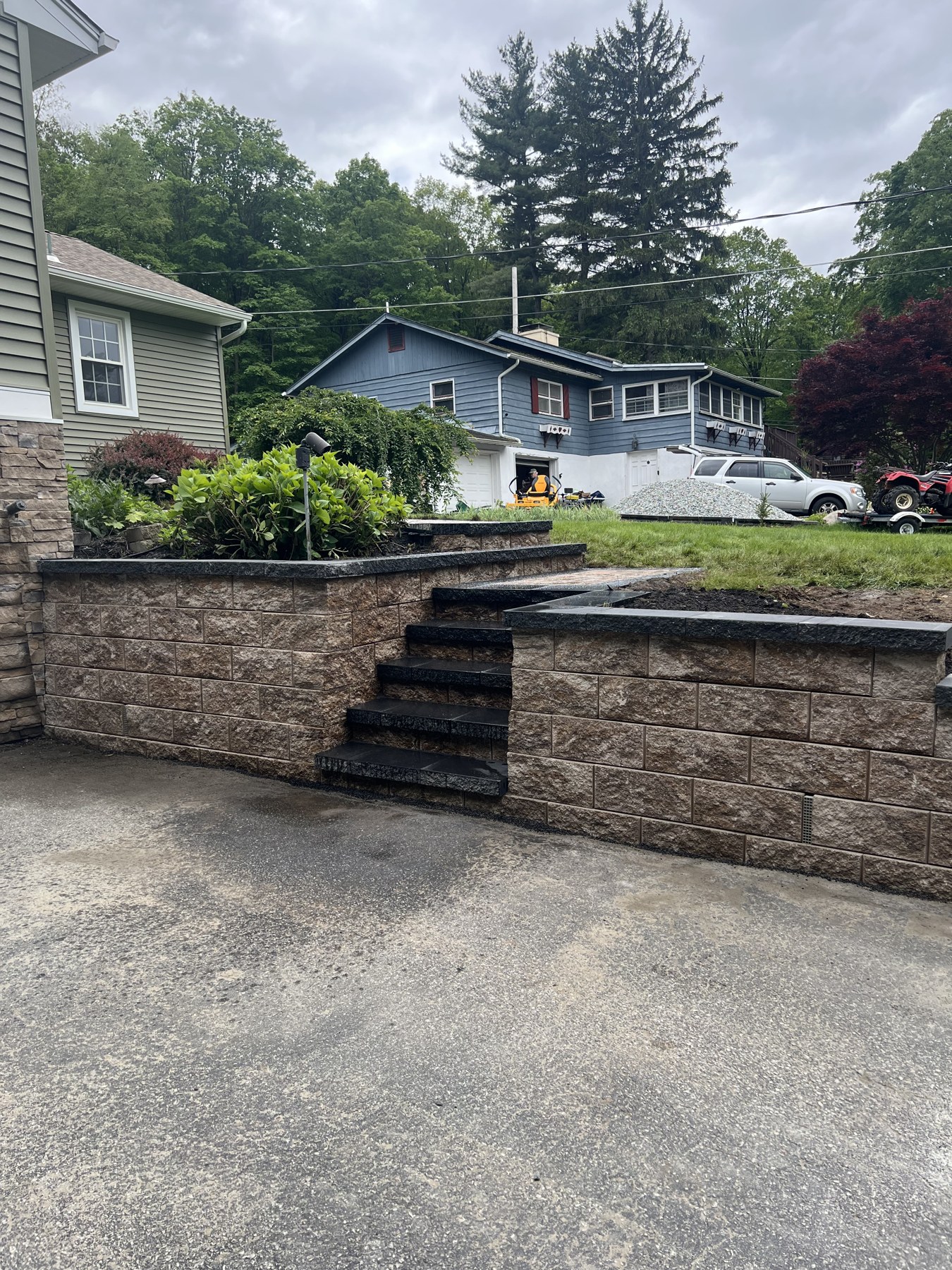 Stone retaining wall with integrated garden steps